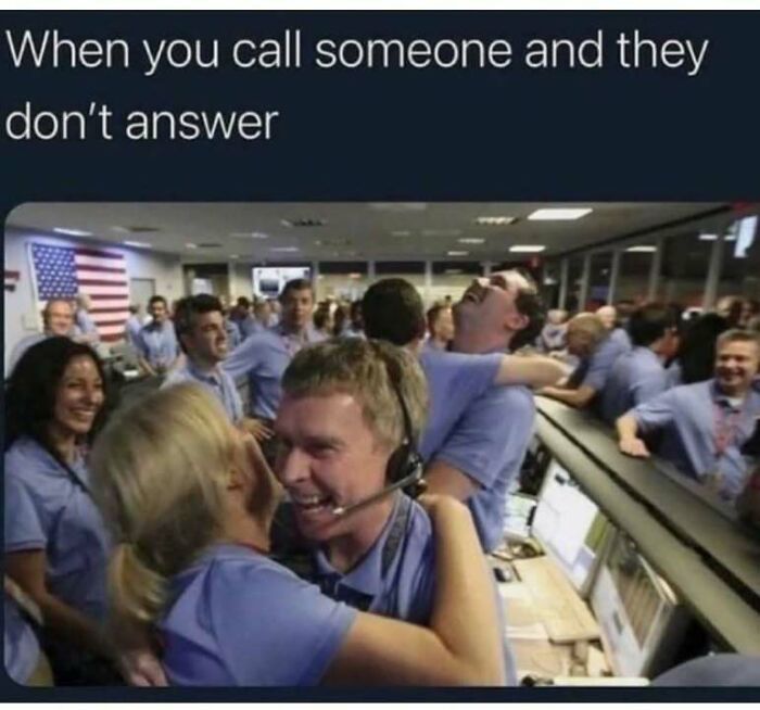 People in a control room joyfully celebrating, symbolizing relief from social interactions.