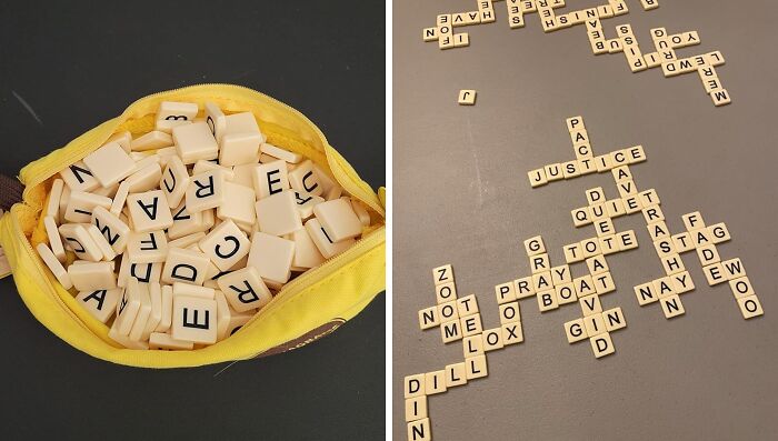 Scrabble tiles spilling from a yellow pouch and arranged words on a gray surface in a straightforward word game setup.