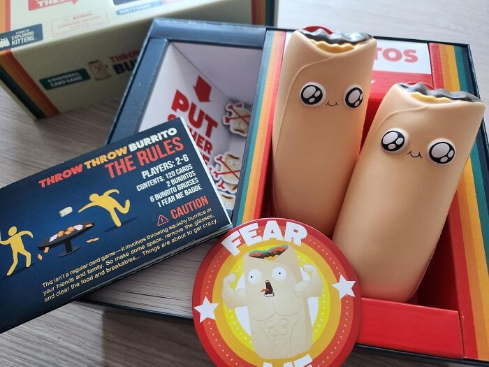 Compact and straightforward game pieces with cute burrito characters and colorful cards for a fun, easy-to-learn tabletop game.