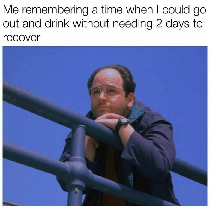 Man leaning on railing, pondering with humorous expression, text above about recovery time after drinking. Men's humor meme.