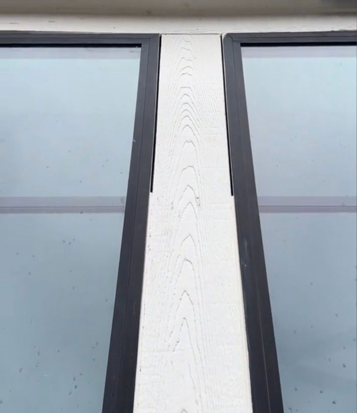 Close-up view of poorly aligned window frames in a $1,600,000 home built 2 years ago, highlighting construction issues. Close-up view of poorly aligned window frames in a $1,600,000 home built 2 years ago, highlighting construction issues.