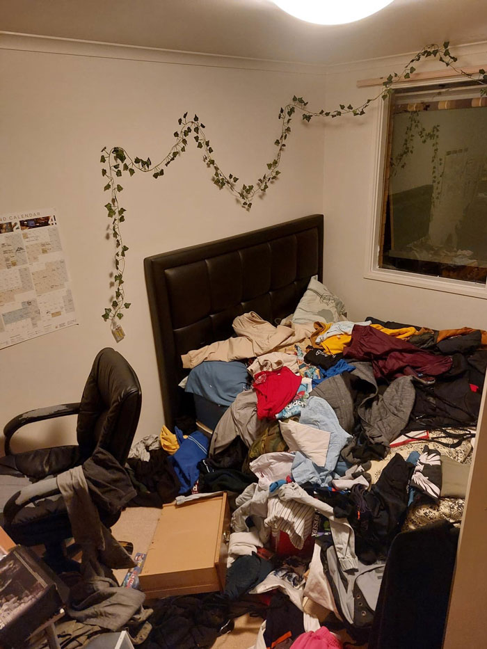 Messy room with clothes scattered everywhere, result of parents breaking in after losing keys. Messy room with clothes scattered everywhere, result of parents breaking in after losing keys.