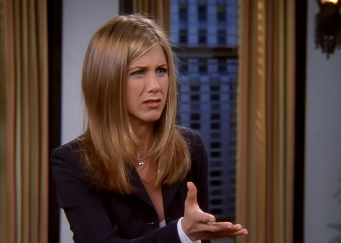 A concerned woman in a business setting discussing deepfake scams. A concerned woman in a business setting discussing deepfake scams.