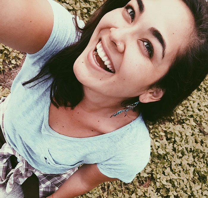 Smiling Hannah Kobayashi in a light blue shirt, standing outdoors, representing the missing woman airport case update. Smiling Hannah Kobayashi in a light blue shirt, standing outdoors, representing the missing woman airport case update.