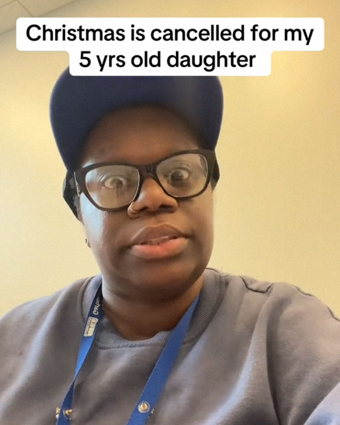 Mom discusses canceling Christmas over 5-year-old's behavior issues at school, looking concerned in a casual setting. Mom discusses canceling Christmas over 5-year-old's behavior issues at school, looking concerned in a casual setting.