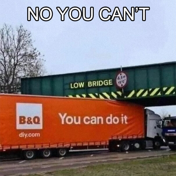 Truck stuck under low bridge, ironic "You can do it" slogan, showcasing absurd sign humor.