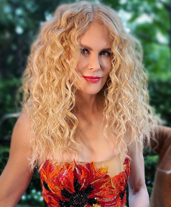 Nicole Kidman in a vibrant floral dress. Nicole Kidman in a vibrant floral dress.