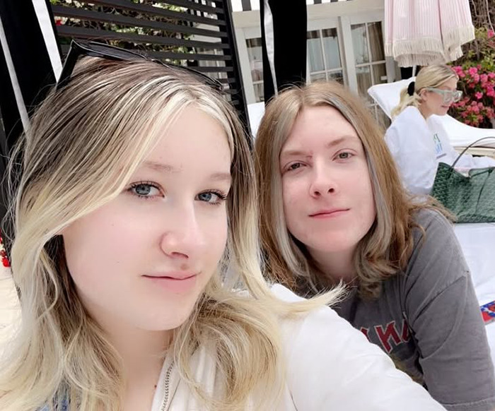 Tori Spelling's children posing for a selfie outdoors. Tori Spelling's children posing for a selfie outdoors.