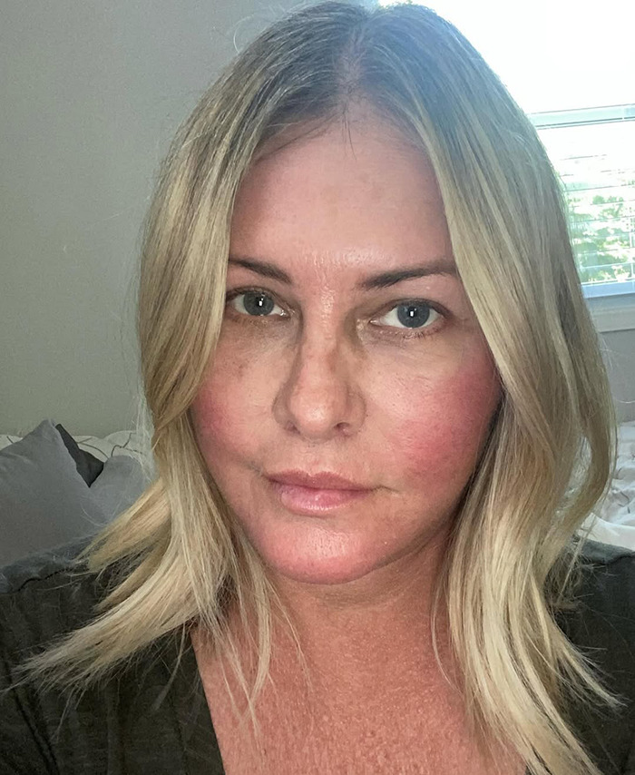 Nicole Eggert with straight hair in a casual setting. Nicole Eggert with straight hair in a casual setting.