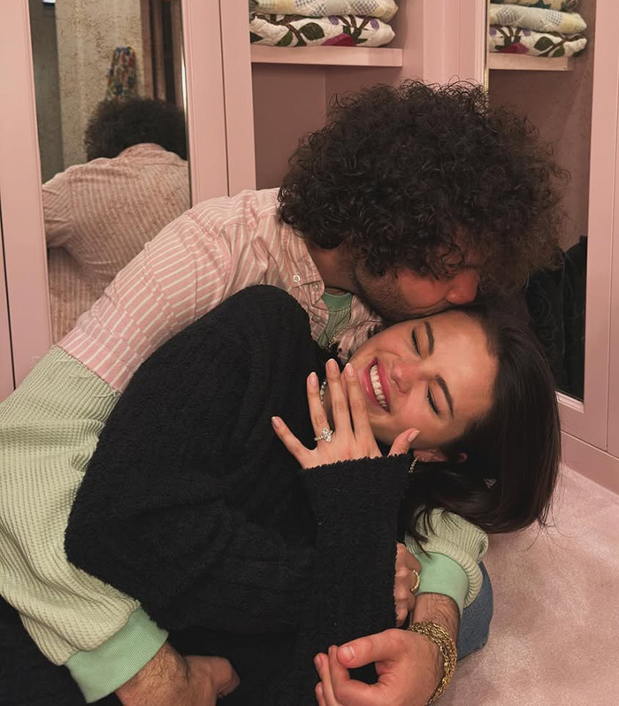 Selena Gomez and Benny Blanco embracing in a cozy setting, highlighting engagement joy. Selena Gomez and Benny Blanco embracing in a cozy setting, highlighting engagement joy.