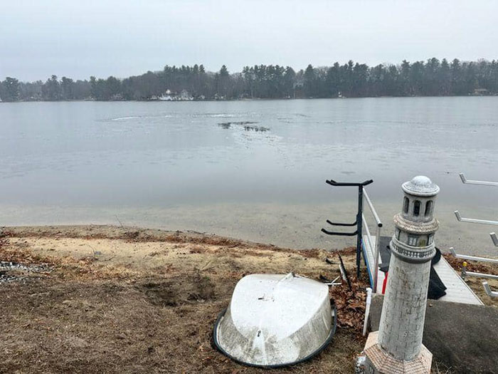 Frozen lake with an ice chunk near a snowy shore, highlighting a rescue scenario involving a blind cat. Frozen lake with an ice chunk near a snowy shore, highlighting a rescue scenario involving a blind cat.