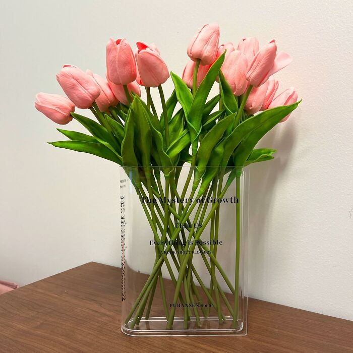 Pink tulips in a clear vase with a motivational quote, ideal for teacher gifts.