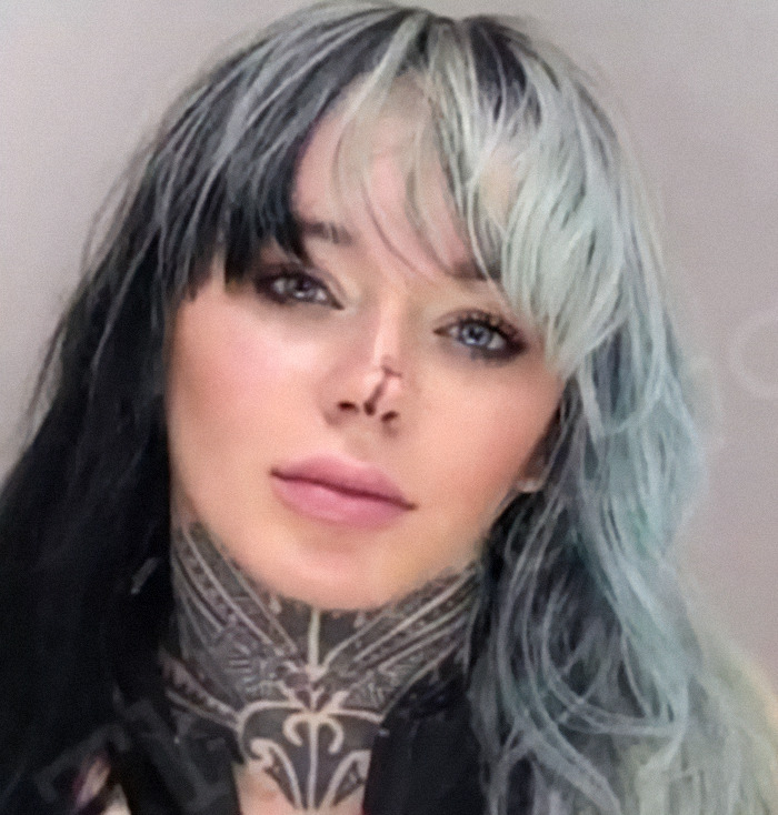 Abbie Newman with multicolored hair and neck tattoo, part of viral mugshots of criminal heartthrobs collection. Abbie Newman with multicolored hair and neck tattoo, part of viral mugshots of criminal heartthrobs collection.