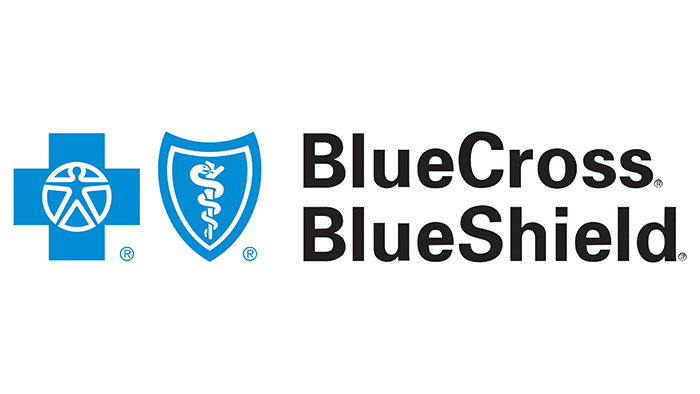 BlueCross BlueShield logo featuring a blue cross and shield symbol. BlueCross BlueShield logo featuring a blue cross and shield symbol.