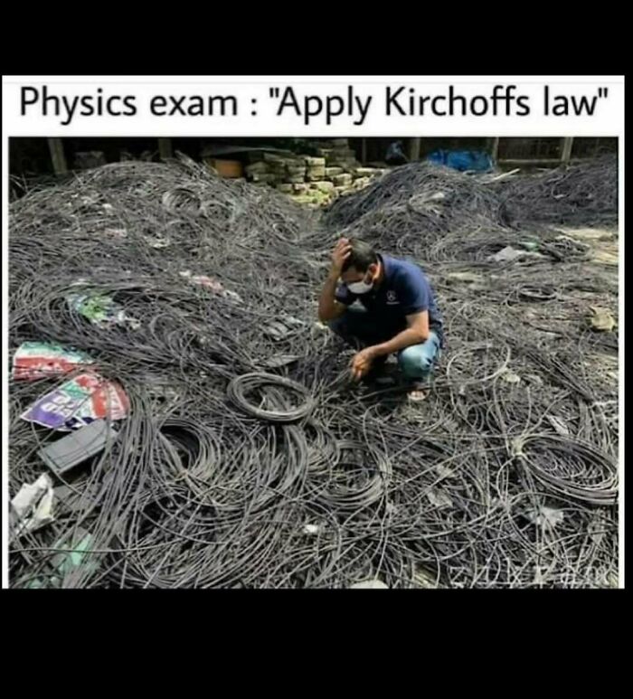 Person surrounded by tangled wires, humorously pondering applying Kirchhoff's law; science meme.