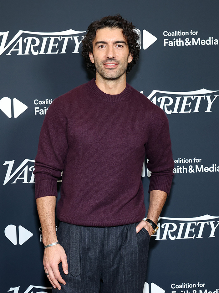 Justin Baldoni in a burgundy sweater at a Variety event backdrop. Justin Baldoni in a burgundy sweater at a Variety event backdrop.