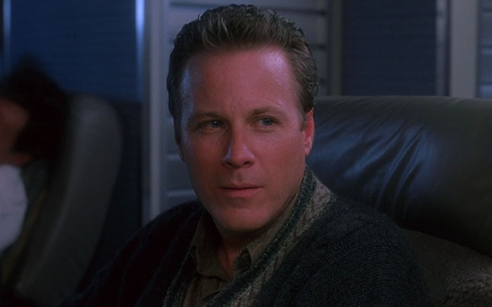 Kevin McCallister's dad on airplane seat looking thoughtfu. Kevin McCallister's dad on airplane seat looking thoughtfu.