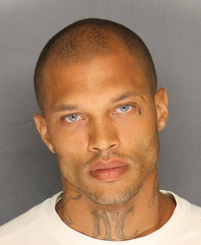 Viral mugshot of Jeremy Meeks with tattoos and blue eyes, wearing a white shirt. Viral mugshot of Jeremy Meeks with tattoos and blue eyes, wearing a white shirt.