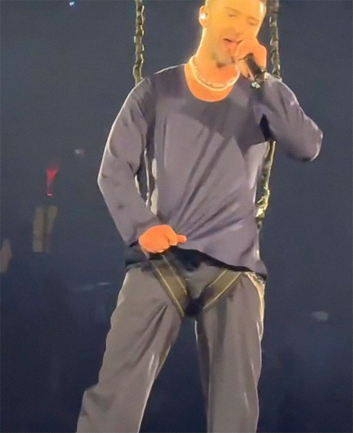 Singer Justin Timberlake experiencing a racy wardrobe malfunction during performance, stirring viral reactions. Singer Justin Timberlake experiencing a racy wardrobe malfunction during performance, stirring viral reactions.