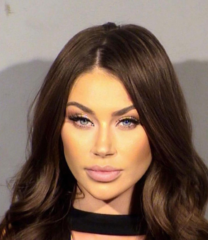 Close-up of Masha Diduk in a mugshot, representing criminal heartthrobs. Close-up of Masha Diduk in a mugshot, representing criminal heartthrobs.