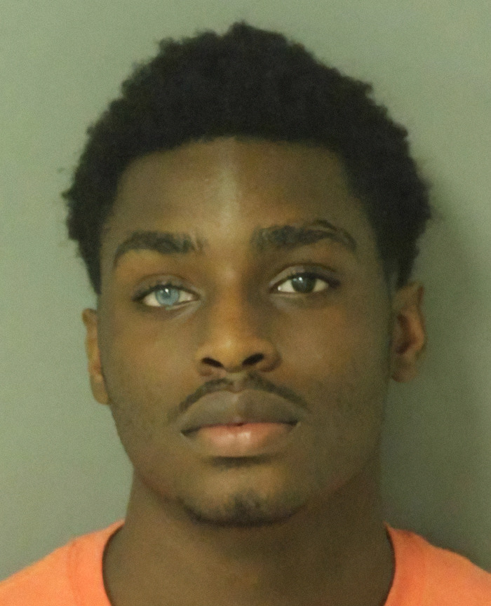 Mekhi Alante Lucky in a bright shirt, one of the viral mugshots tagged as a criminal heartthrob. Mekhi Alante Lucky in a bright shirt, one of the viral mugshots tagged as a criminal heartthrob.