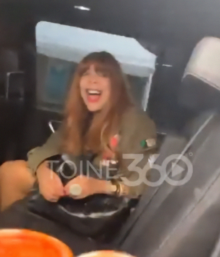 Wendy Williams laughing in a car during rare outing, wearing a green jacket. Wendy Williams laughing in a car during rare outing, wearing a green jacket.