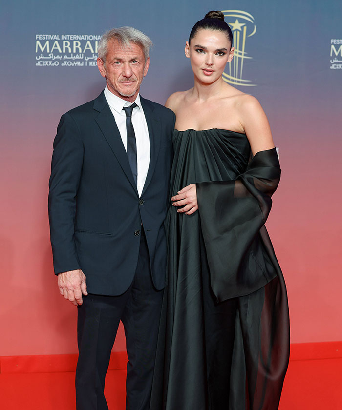 Sean Penn, 64, with girlfriend at red carpet event, highlighting their age difference. Sean Penn, 64, with girlfriend at red carpet event, highlighting their age difference.