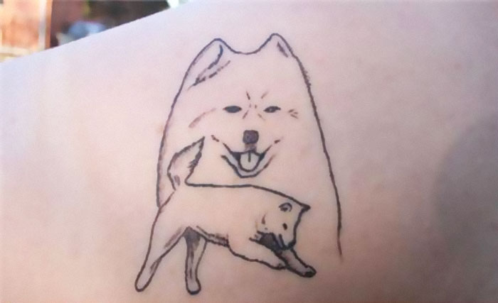 Poorly drawn dog tattoo fail with distorted features that might make you cringe.