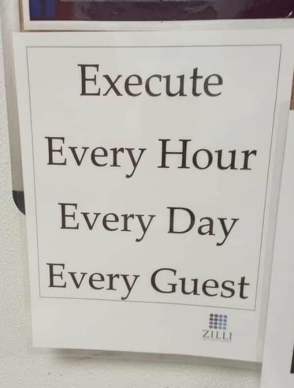 Weird sign saying "Execute Every Hour Every Day Every Guest," displayed humorously.