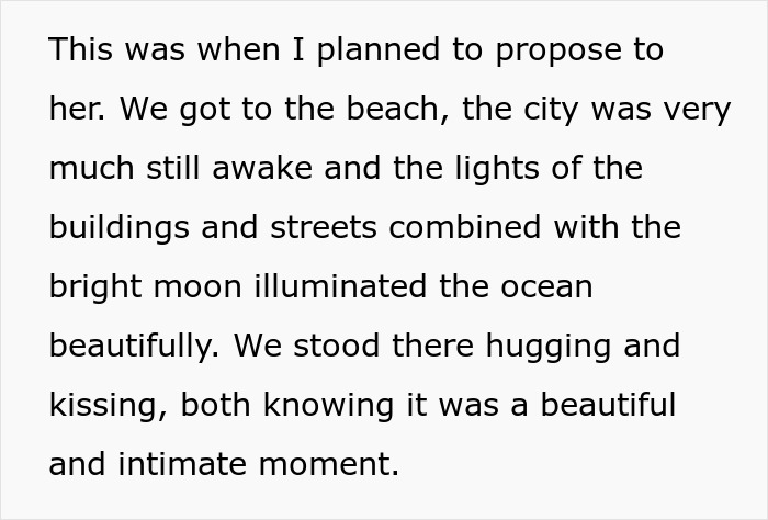 Text about a romantic beach proposal illuminated by city lights and the moon. Text about a romantic beach proposal illuminated by city lights and the moon.