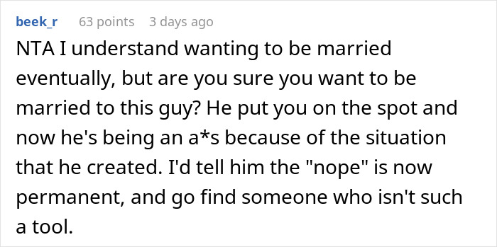 Reddit comment discussing a public proposal and private rejection, questioning marriage choice. Reddit comment discussing a public proposal and private rejection, questioning marriage choice.