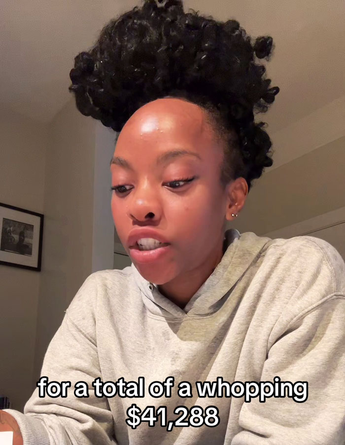 Person reacting to an insane hospital bill costing $41,288. Person reacting to an insane hospital bill costing $41,288.