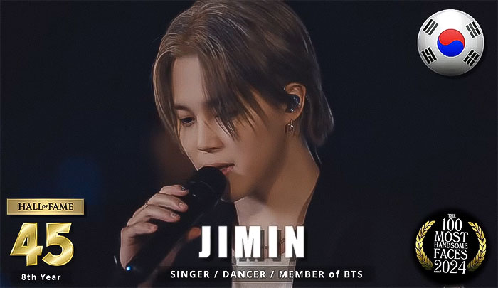 Singer performing on stage, ranked among the most handsome men of 2024 by critics. Singer performing on stage, ranked among the most handsome men of 2024 by critics.