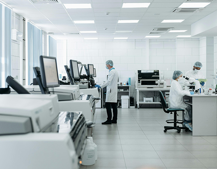Stock photo of scientists in a lab. Stock photo of scientists in a lab.