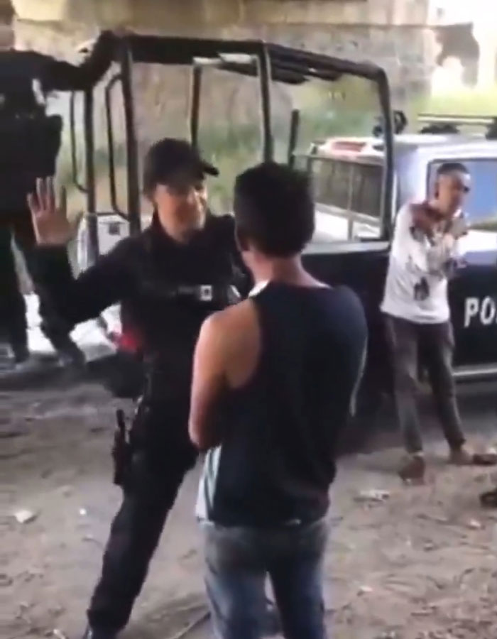 Police Officers Humiliate, Beat, And Force Two Men To Kiss Each Other: "Stick Your Tongue In" Police Officers Humiliate, Beat, And Force Two Men To Kiss Each Other: "Stick Your Tongue In"