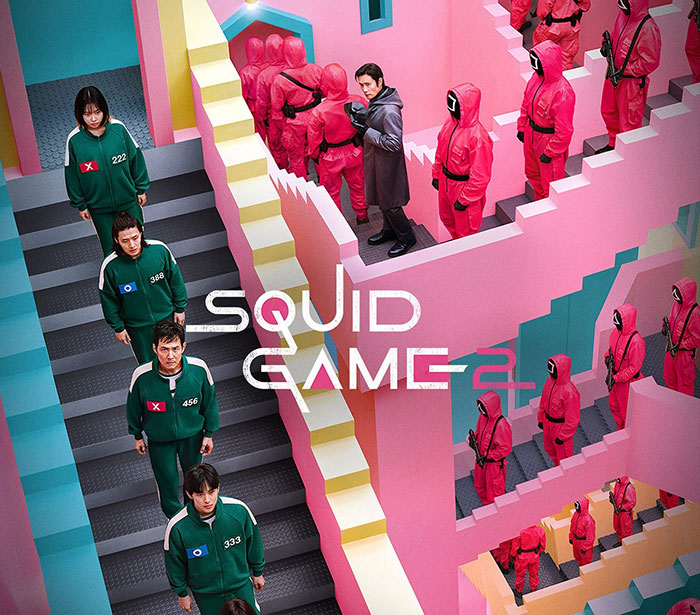 "Squid Game 2 promotional poster with characters in colorful, geometric setting. "Squid Game 2 promotional poster with characters in colorful, geometric setting.