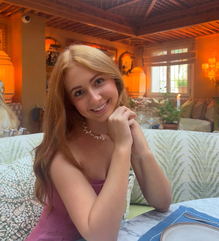 Peyton Spaht smiling in an elegant setting. Peyton Spaht smiling in an elegant setting.