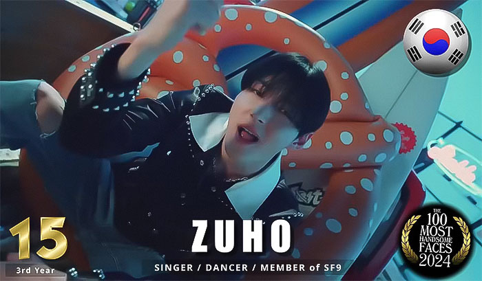 Korean artist ranked among the most handsome men of 2024, sitting in a colorful setting. Korean artist ranked among the most handsome men of 2024, sitting in a colorful setting.