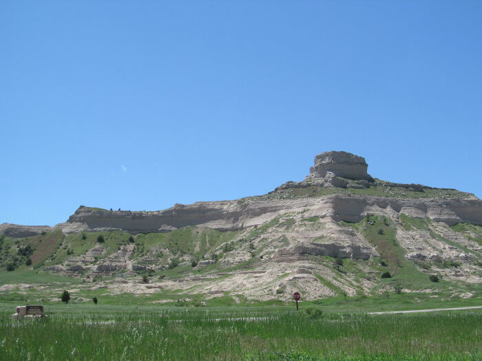 Scenic landscape showcasing amazing views of Scotts Bluff, Nebraska, under a clear blue sky.