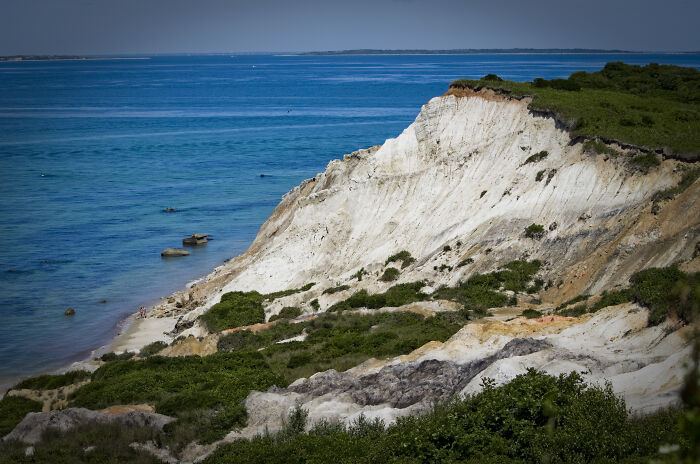 Stunning coastal cliff views over the ocean on a clear day, showcasing amazing views states.