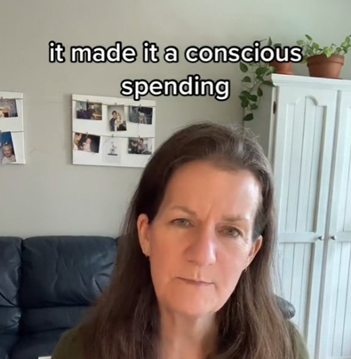 Expert discusses conscious spending at home with a backdrop of photos and plants. Expert discusses conscious spending at home with a backdrop of photos and plants.