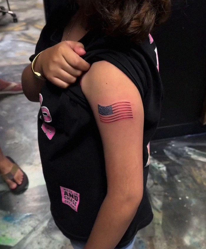 “Shame”: 9-Year-Old Girl Walks Out With American Flag Tattoo, Artist Faces Backlash “Shame”: 9-Year-Old Girl Walks Out With American Flag Tattoo, Artist Faces Backlash