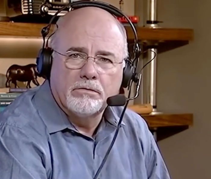 A finance expert wearing a headset discusses income combining for married couples. A finance expert wearing a headset discusses income combining for married couples.