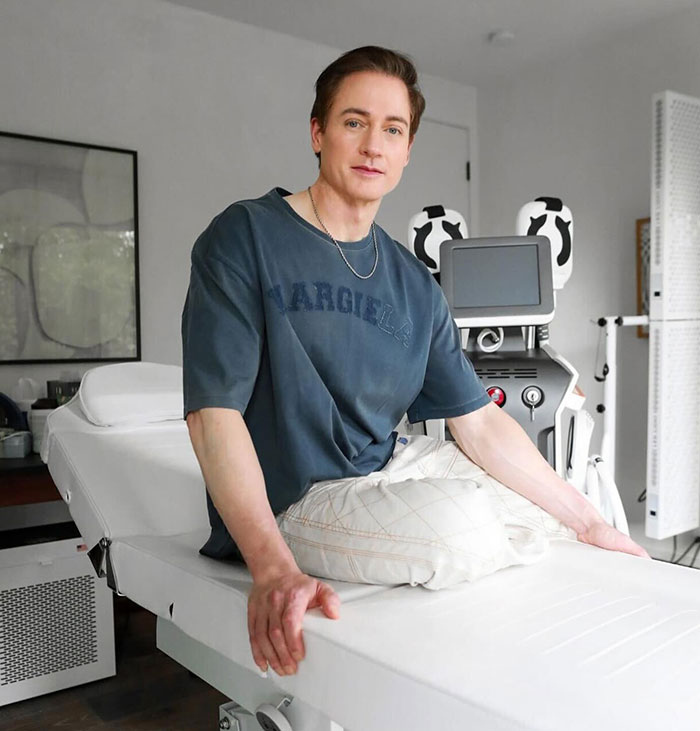 Man in a casual setting, related to billionaire reversing aging controversies. Man in a casual setting, related to billionaire reversing aging controversies.