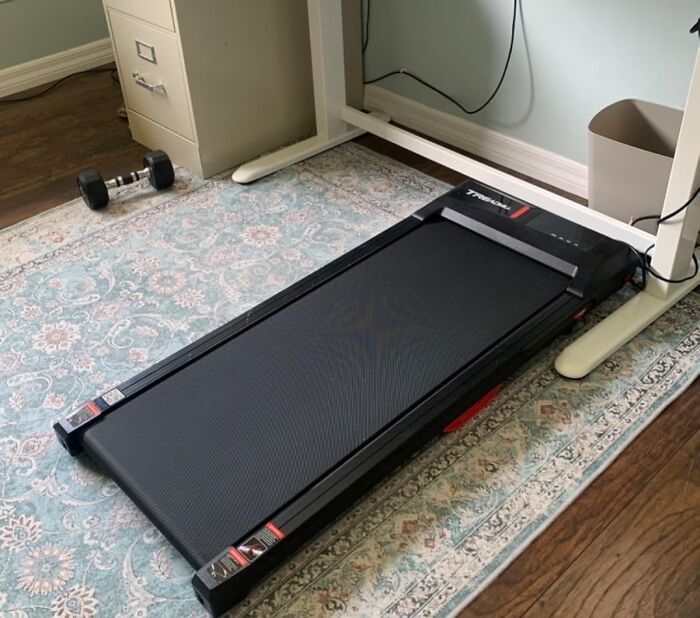 Under desk treadmill on a patterned rug, perfect for Amazon winter deals biggest discounts.