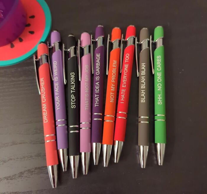 Assorted colorful pens with sarcastic messages, a popular panda product with high upvotes.