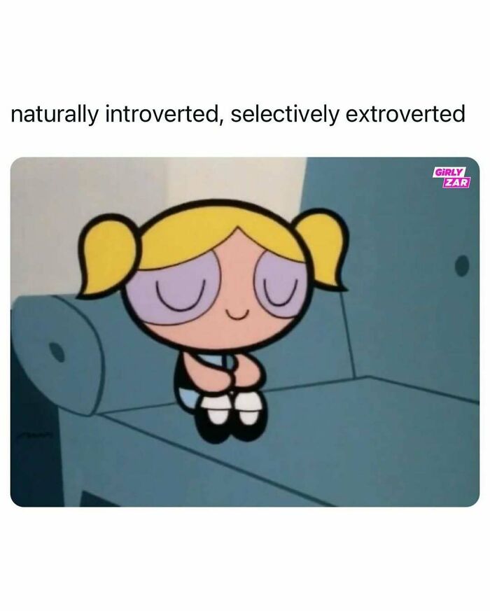 Cartoon character sitting on couch with caption about being naturally introverted and selectively extroverted humor coping mechanism humor post.