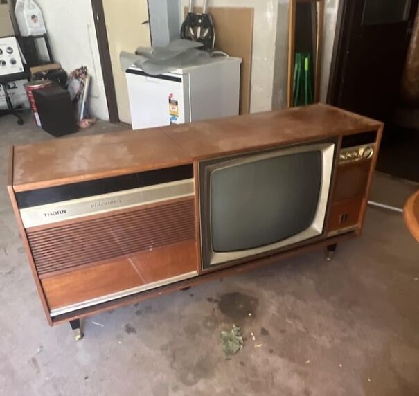 Retro TV set with wooden cabinet, evoking nostalgia for the good old days.