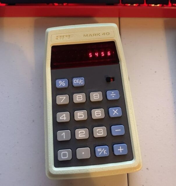 Retro find: a vintage Mark 40 calculator displaying the number 5456 on a table surface.