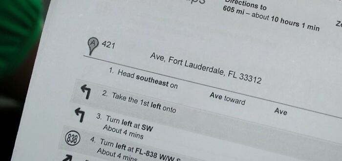Printed driving directions on paper show a route from Fort Lauderdale, reminiscent of being a teen in the 2000s.
